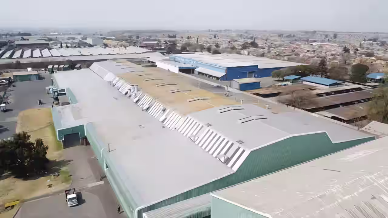 Torch-on waterproofing on a warehouse roof in Johannesburg