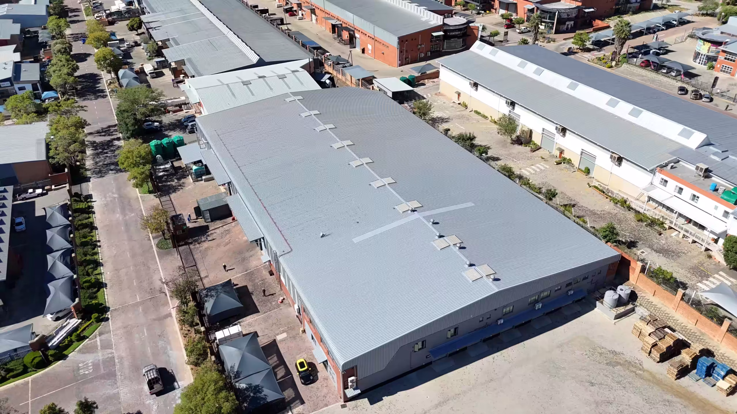 Roof upkeep on a shopping centre in the East Rand