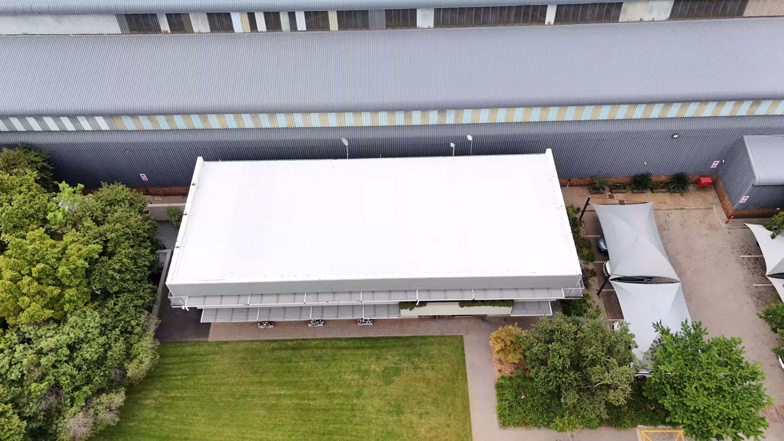 Parapet sealing on an office park roof in Johannesburg