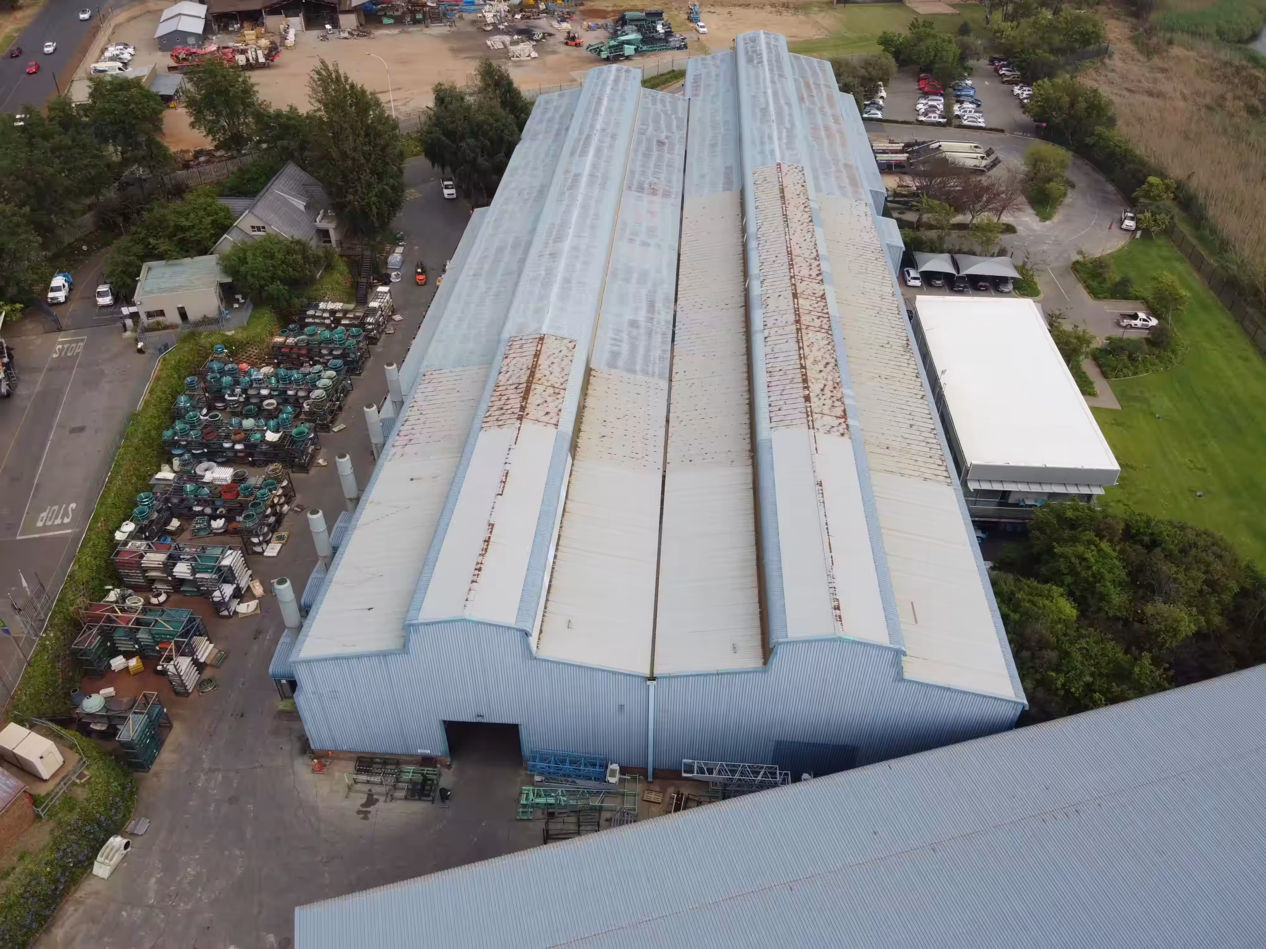 Corroded commercial roof before restoration in Gauteng
