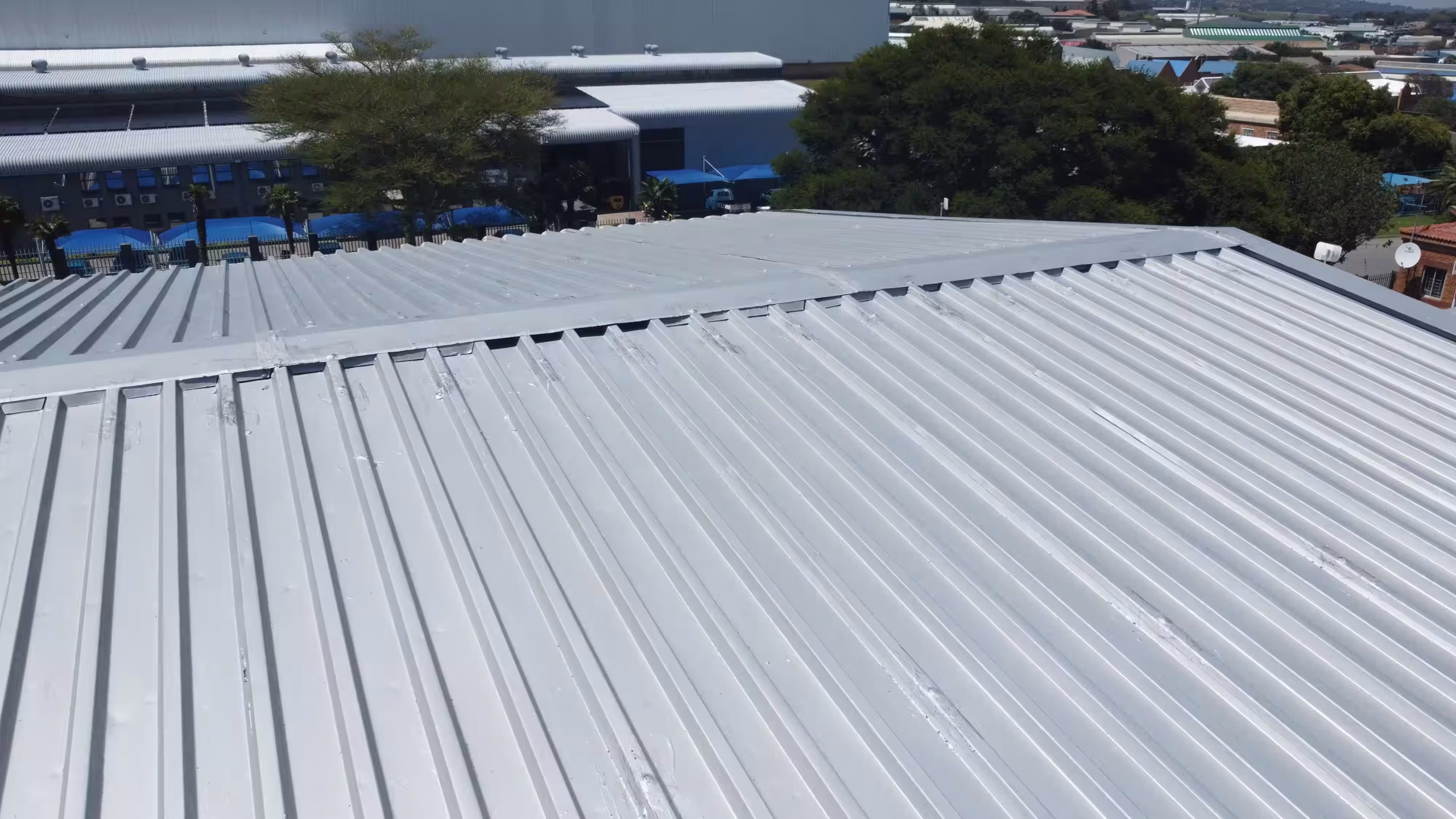 Flat roof waterproofing on a retail building in Benoni